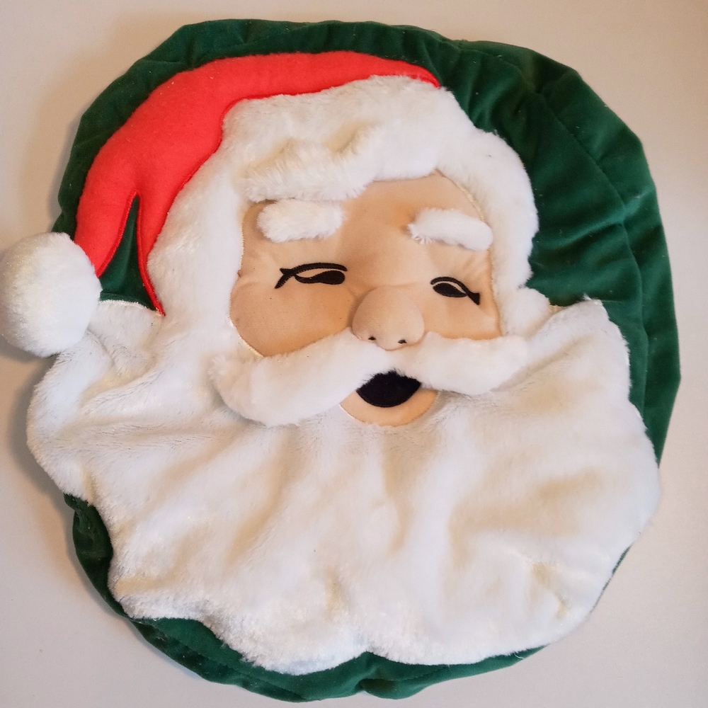 Santa Clause toilet seat cover. Santa face.